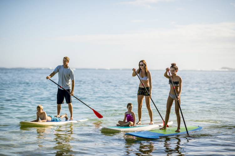 family paddle boarding